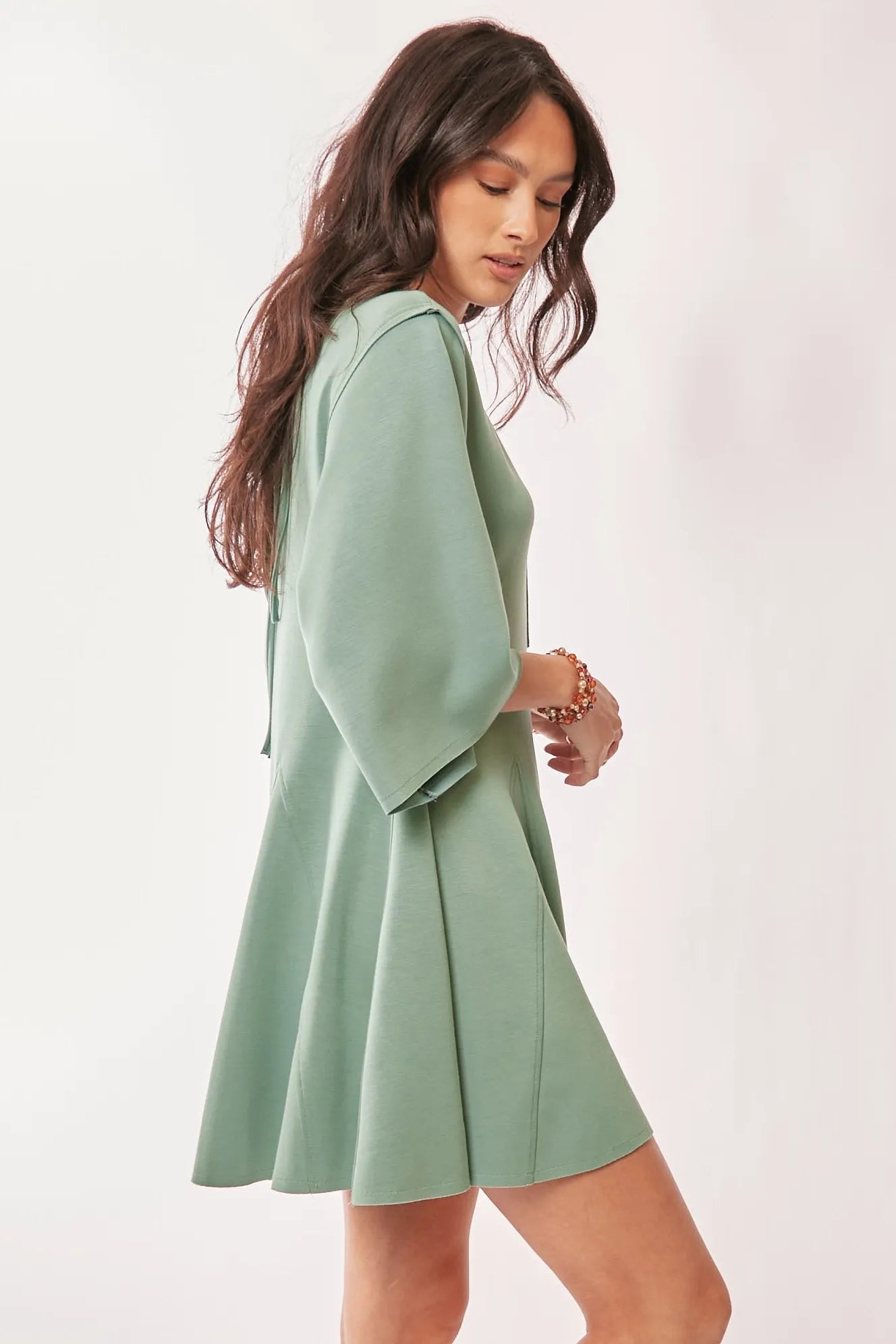 Davi & Dani Solid Draped Sleeve Ties Back Skort Romper